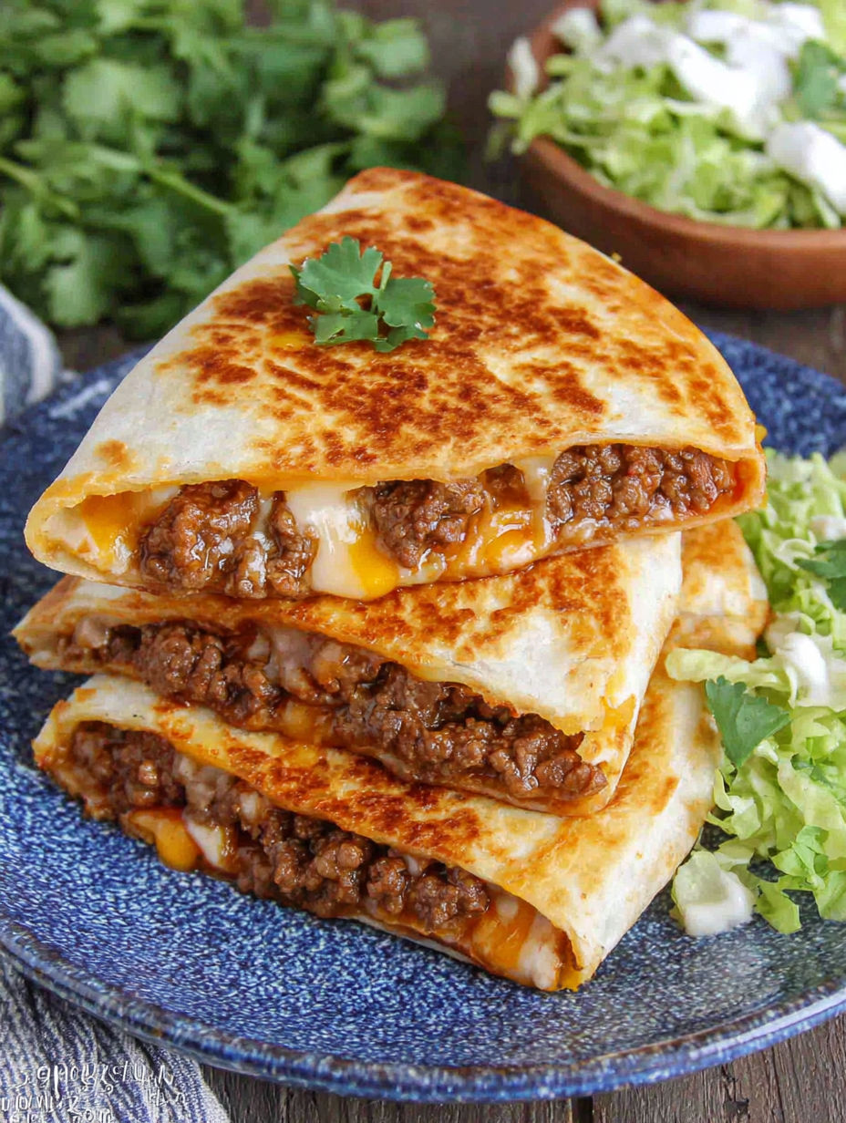 A stack of cheesy ground beef quesadillas.
