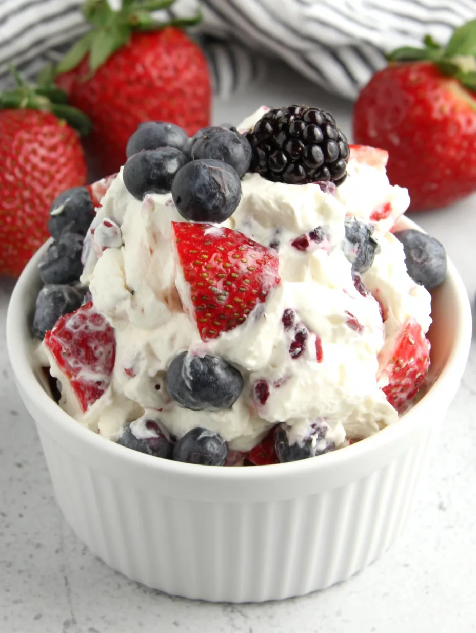 A bowl of berry cheesecake salad.