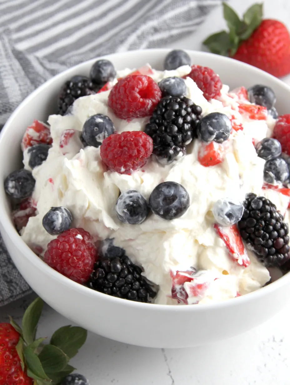 A bowl of berry cheesecake salad.