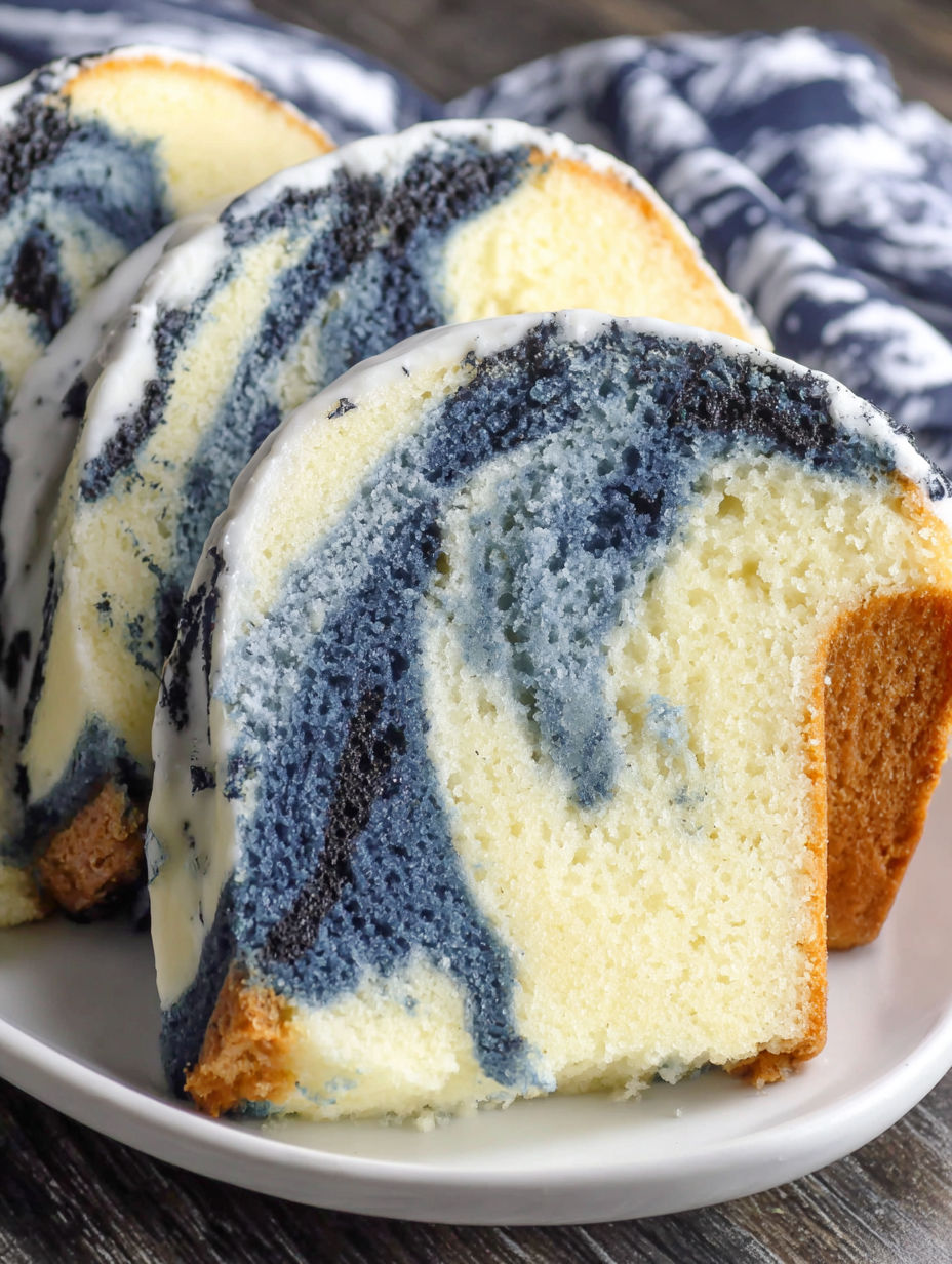 A slice of blue velvet swirl vanilla pound cake.