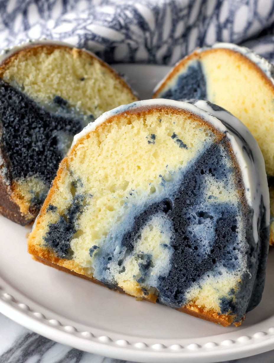 A slice of blue velvet swirl vanilla pound cake.