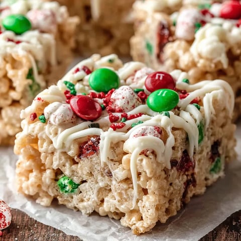 A close up of a Rice Krispie treat with a marshmallow on top.