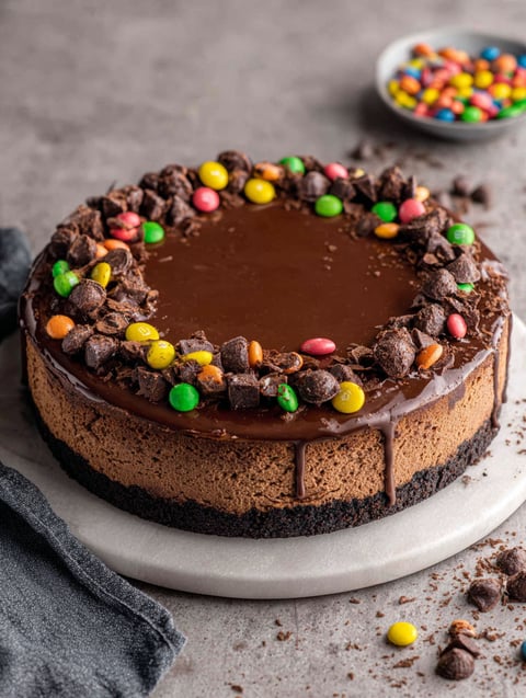 A slice of Cosmic Brownie Cheesecake.