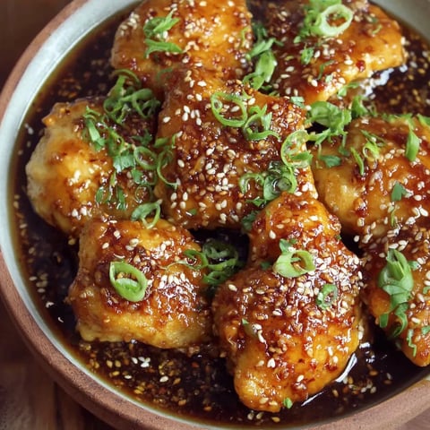 A serving of sweet honey sesame chicken.