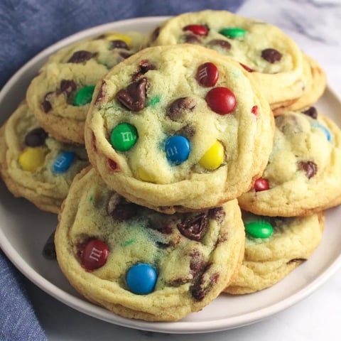 A plate of soft baked M&M cookies.