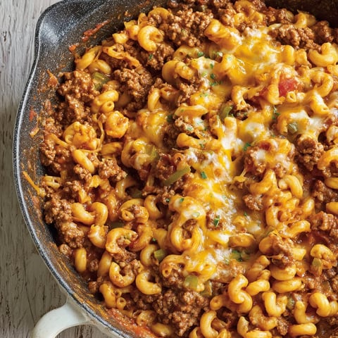 A bowl of chili mac and cheese.