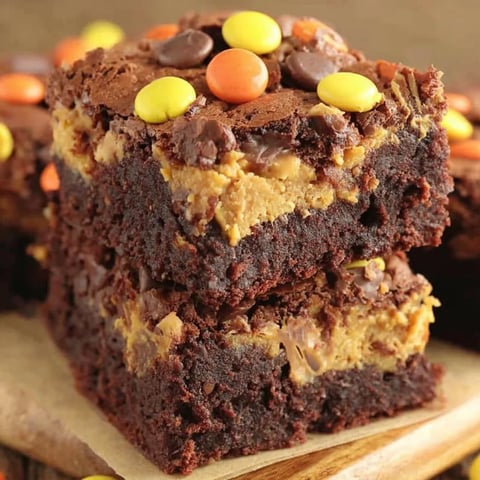A slice of Reese's Brownies with chocolate and peanut butter.
