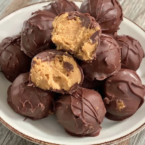 A plate of chocolate peanut butter balls.