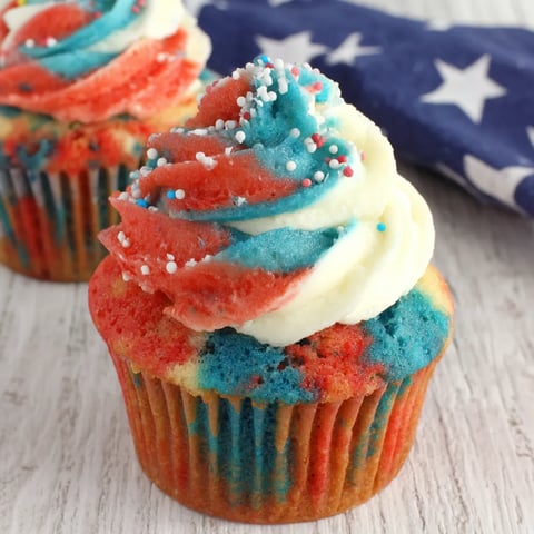 Two red white and blue cupcakes.
