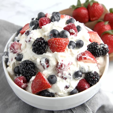 A bowl of berry cheesecake salad.