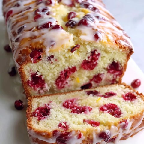 A slice of cranberry orange bread.