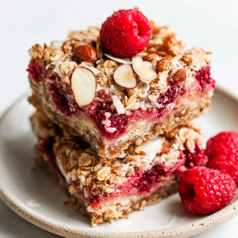 A stack of raspberry breakfast bars.