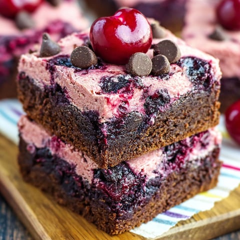 A slice of chewy chocolate cherry brownies.