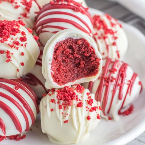 A plate of red velvet cake balls.