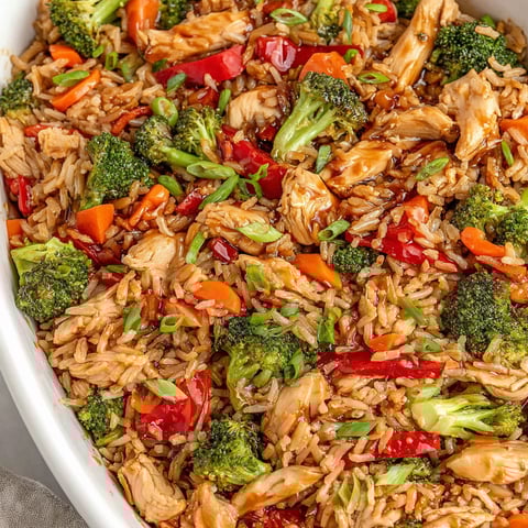 A dish of Teriyaki Chicken Casserole with rice and broccoli.